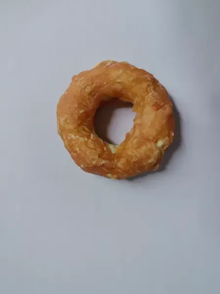 Golden chicken donut ring treat photographed from above