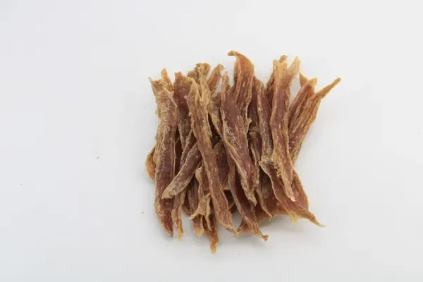 Loose pile of dried shredded duck meat strips
