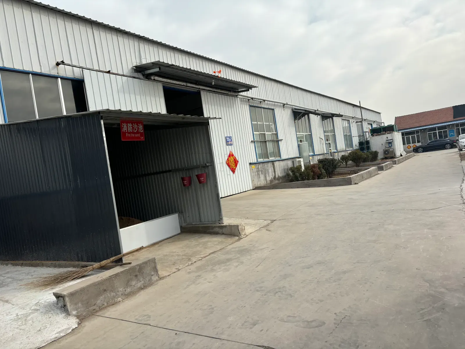 Loading area beside the production workshop building