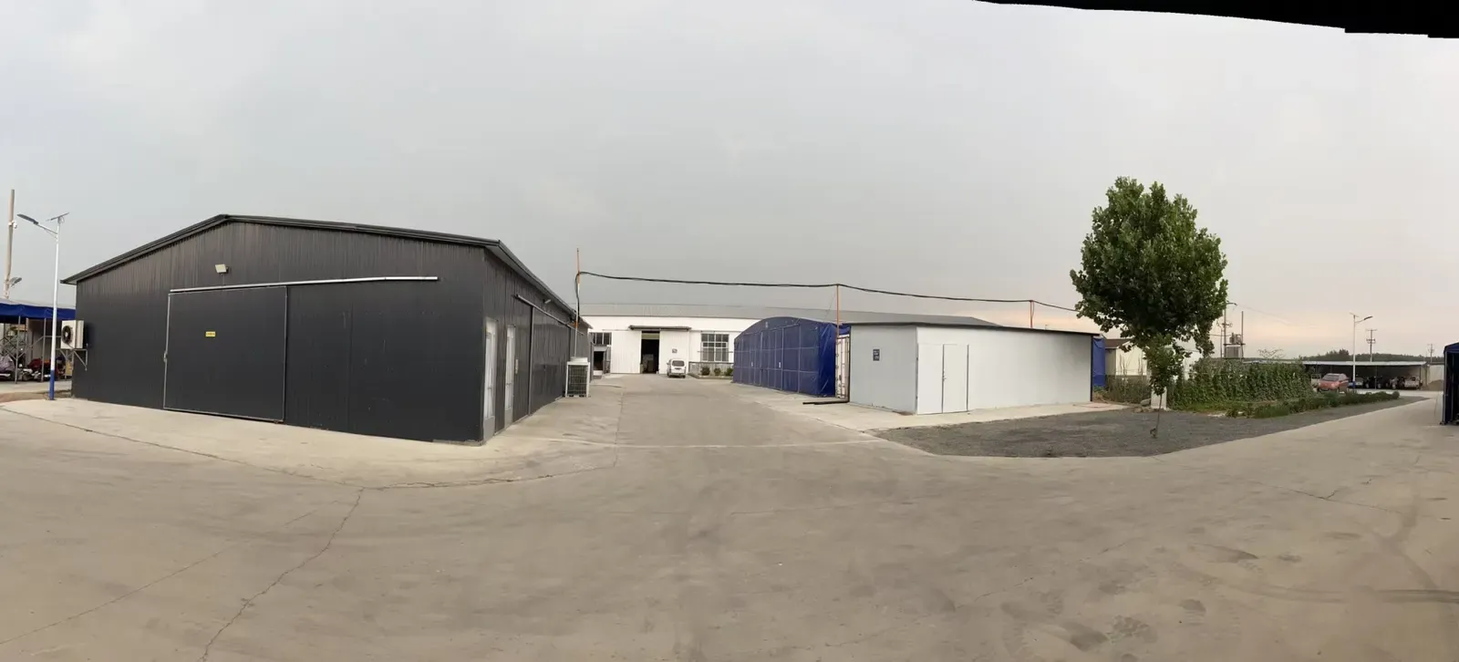Factory yard with single-storey production buildings