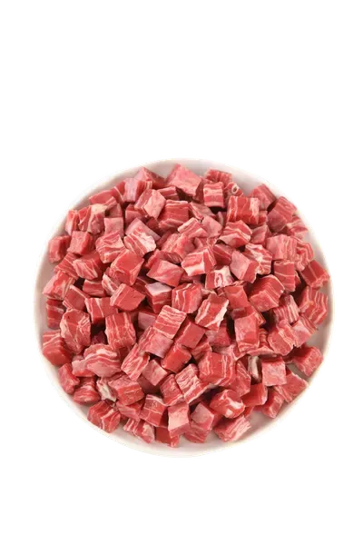 Bowl of small red meat dices with a firm dried texture