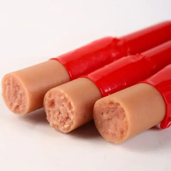 Pet sausages in red casing showing the uniform pink filling
